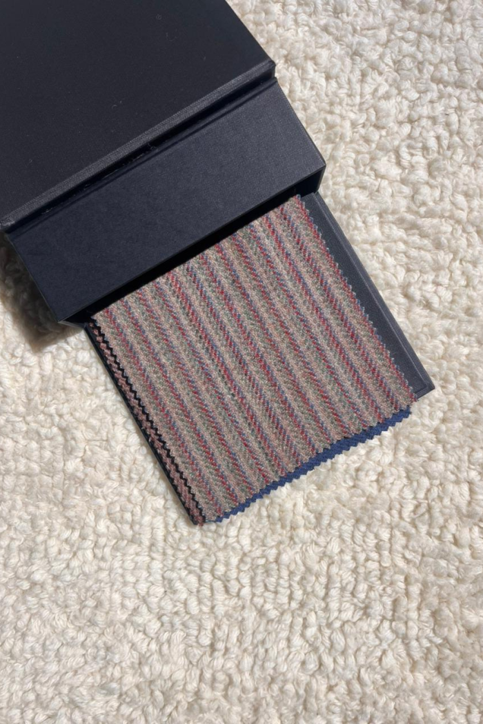 warm beige with pin stripes.